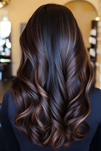 Espresso Brown with Chestnut Balayage Hair Color on a woman with dark brown hair and balayage highlights, image shot from back in hair salon.