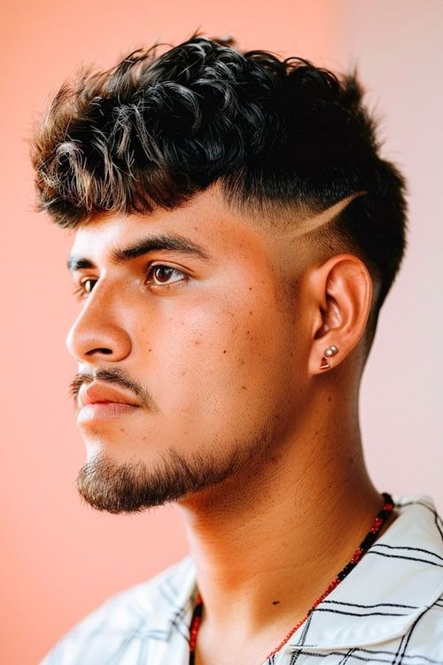 Corte Edgar con la parte superior voluminosa Peinado Edgar para hombre.