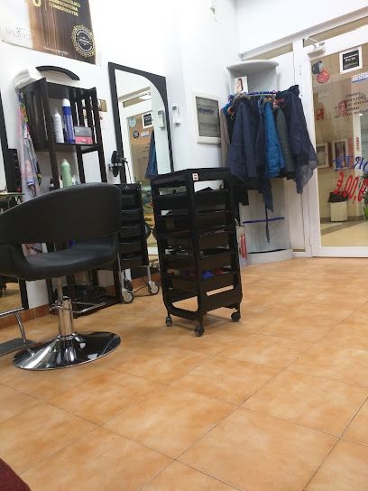 Jhon & Robin Peluquería y Barbería.