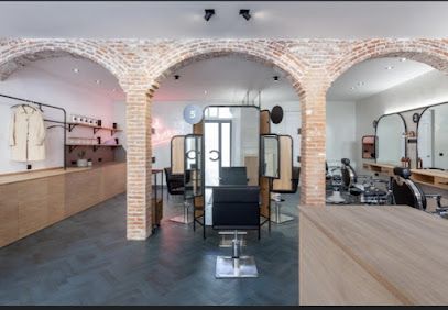 César Peluqueros & Barbería